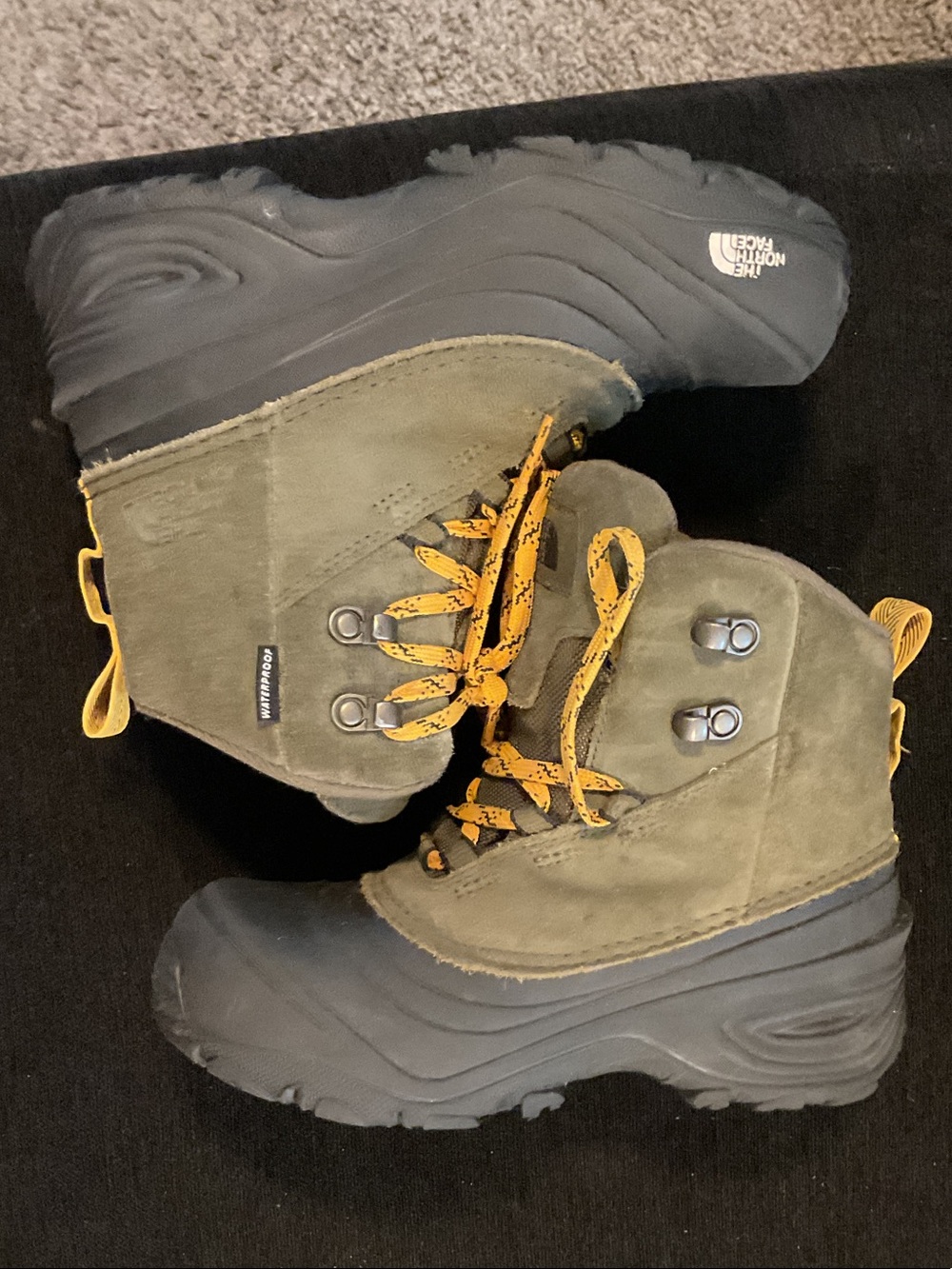 The North Face Olive Suede Insulated Boots with Yellow Laces
